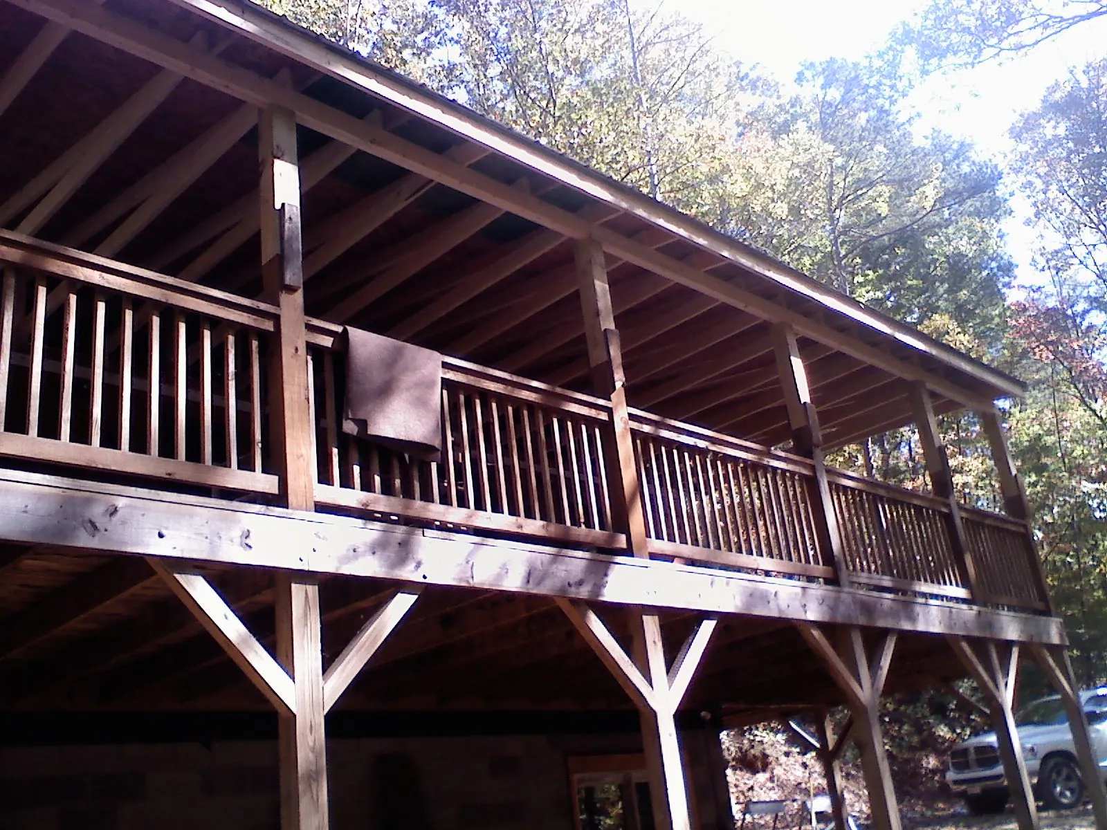 Timber framing under a new elevated porch and deck — Roof Leak Repair in Rockford by Roofing Brothers